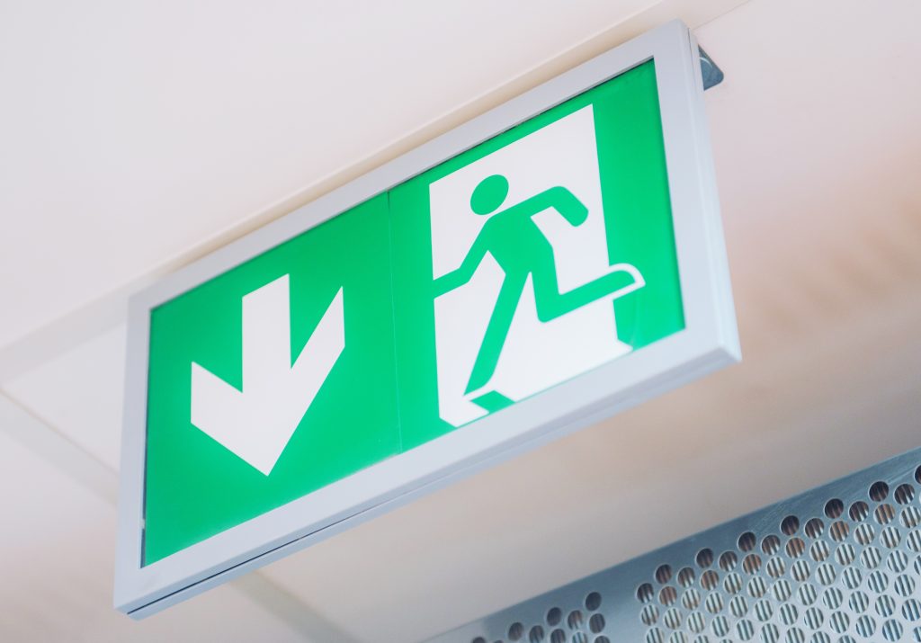 Evacuation Exit Interior Sign. Building and Interiors Safety Signs.